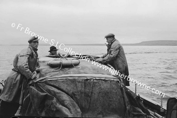 BOATS AND BOATMEN WITH LIFEBOAT TO INNISHMAAN